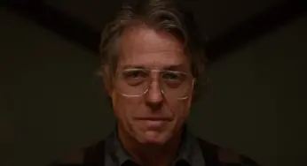 Hugh Grant usa seu charme como a maior arma do vilão em Herege